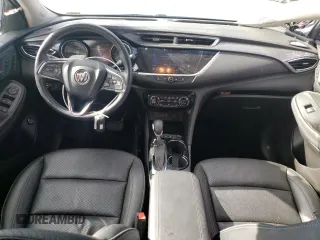 2023 Buick Encore GX Essence with VIN KL4MMGSL8PB056184, listed as a Copart auction lot 71814824 with 23,948 mi miles and Salvage title. Bid and sale history available at DreamBid. Image 8.