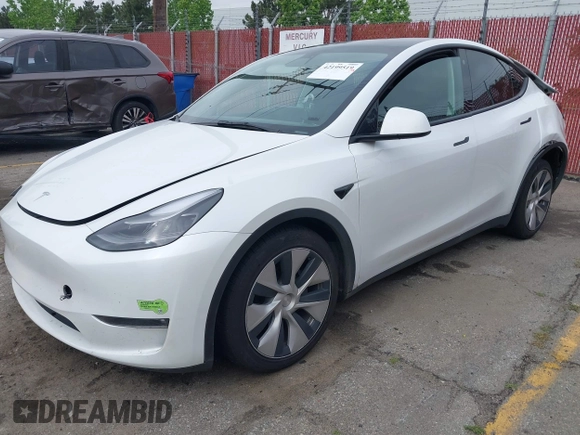 2023 Tesla Model Y Long Range with VIN 7SAYGAEE9PF702910, listed as a IAAI auction lot 42199519 with 91,094 mi miles and . Bid and sale history available at DreamBid. Image 20.
