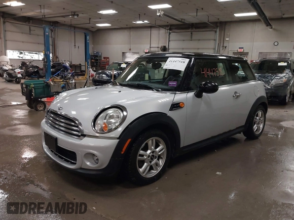 2013 MINI Hardtop with VIN WMWSU3C51DT374317, listed as a IAAI auction lot 41447518 with 142,943 mi miles and . Bid and sale history available at DreamBid. Image 2.