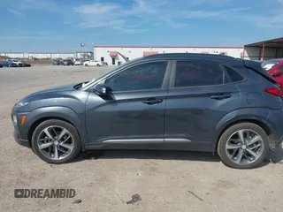 2021 Hyundai Kona Ultimate with VIN KM8K53A50MU601084, listed as a IAAI auction lot 41900099 with 56,171 mi miles. Bid and sale history available at carsss.com. Image 14.