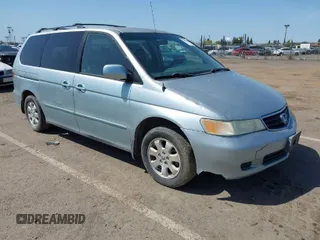 2003 Honda Odyssey EX with VIN 2HKRL18603H502236, listed as a IAAI auction lot 41929501 with 287,538 mi miles and . Bid and sale history available at carsss.com. Image 1.