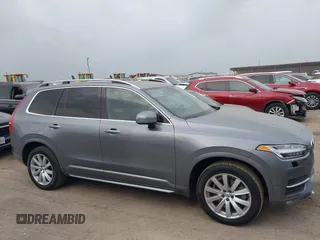 2016 Volvo XC90 T6 Momentum z VIN YV4A22PK5G1055854, wystawiony jako IAAI lot #41915279 z przebiegiem 88 237 mil mil oraz . Historia ofert i sprzedaży dostępna na DreamBid. Obrazek 13.