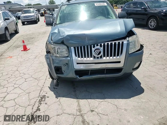 2010 Mercury Mariner with VIN 4M2CN9B70AKJ08597, listed as a Copart auction lot 63486595 with 113,207 mi miles and Salvage title. Bid and sale history available at DreamBid. Image 14.