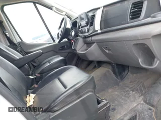 2023 Ford Transit Cargo with VIN 1FTBR3X86PKA69978, listed as a IAAI auction lot 41815672 with 60,590 mi miles and . Bid and sale history available at DreamBid. Image 5.