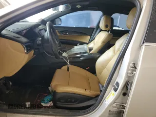 2014 Cadillac ATS Standard RWD z VIN 1G6AA5RA2E0101299, wystawiony jako Copart lot #49240615 z przebiegiem 165 498 mil mil oraz Szkody całkowita. Historia ofert i sprzedaży dostępna na DreamBid. Obrazek 7.