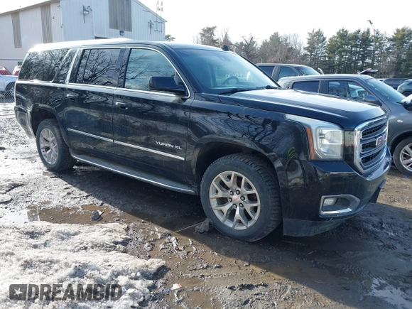 2015 GMC Yukon XL SLT with VIN 1GKS2HKC9FR159164, listed as a IAAI auction lot 41708822 with 136,730 mi miles. Bid and sale history available at carsss.com. Image 1.