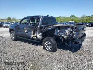 2017 Toyota Tacoma SR5 with VIN 5TFAZ5CN0HX040886, listed as a Copart auction lot 52764935 with 171,252 mi miles and Salvage Title. Bid and sale history available at carsss.com. Image 2.