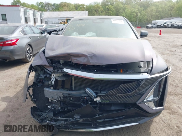 2024 Cadillac LYRIQ z VIN 1GYKPMRLXRZ141816, wystawiony jako IAAI lot #42113732 z przebiegiem 7 704 mil mil oraz . Historia ofert i sprzedaży dostępna na DreamBid. Obrazek 12.