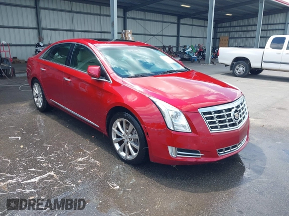 2013 Cadillac XTS Premium with VIN 2G61S5S34D9237236, listed as a IAAI auction lot 41994164 with 218,719 mi miles. Bid and sale history available at carsss.com. Image 1.