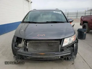 2014 Honda Odyssey Touring z VIN 5FNRL5H91EB121062, wystawiony jako Copart lot #53546515 z przebiegiem 192 136 mil mil oraz Szkoda całkowita • Salvage title. Historia ofert i sprzedaży dostępna na DreamBid. Obrazek 5.
