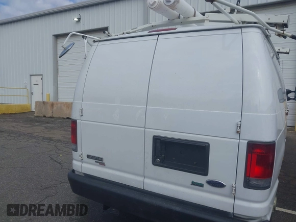 2012 Ford Econoline Cargo Commercial with VIN 1FTNE1EWXCDB38975, listed as a IAAI auction lot 41747167 with 331,484 mi miles and . Bid and sale history available at carsss.com. Image 16.