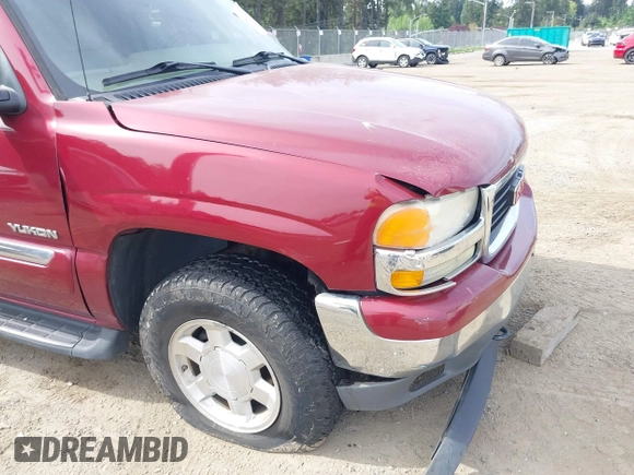 2005 GMC Yukon SLT z VIN 1GKEK13T25J164173, wystawiony jako IAAI lot #42241124 z przebiegiem 220 313 mil mil oraz . Historia ofert i sprzedaży dostępna na DreamBid. Obrazek 6.