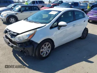 2014 Kia Rio LX with VIN KNADM4A30E6370761, listed as a IAAI auction lot 42097075 with 126,752 mi miles. Bid and sale history available at carsss.com. Image 2.