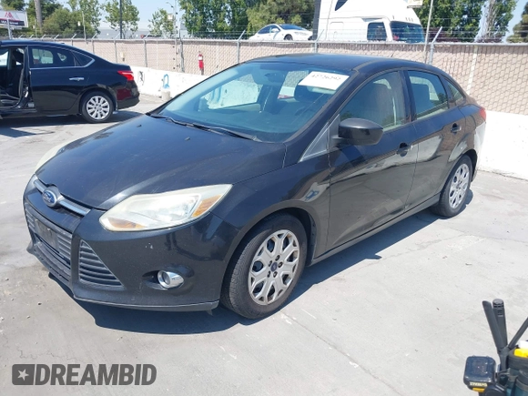 2012 Ford Focus SE with VIN 1FAHP3F24CL471005, listed as a IAAI auction lot 42726292 with 162,750 mi miles and . Bid and sale history available at DreamBid. Image 2.