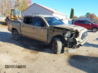 2019 Toyota Tacoma SR5 with VIN 3TMAZ5CN6KM095694, listed as a IAAI auction lot 40698228 with 98,706 mi miles and . Bid and sale history available at DreamBid. Image 1.
