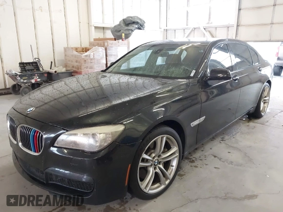 2011 BMW 7 Series 750Li xDrive with VIN WBAKC8C58BC432517, listed as a IAAI auction lot 41874352 with 125,288 mi miles and . Bid and sale history available at DreamBid. Image 2.