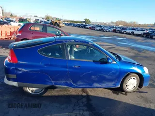 2002 Honda Insight z VIN JHMZE14722T000006, wystawiony jako IAAI lot #41049894 z przebiegiem 185 989 mil mil oraz . Historia ofert i sprzedaży dostępna na DreamBid. Obrazek 14.