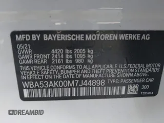 2021 BMW 2 Series 228i with VIN WBA53AK00M7J44898, listed as a IAAI auction lot 41784086 with 42,329 mi miles. Bid and sale history available at carsss.com. Image 9.