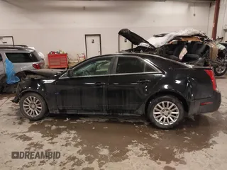 2010 Cadillac CTS with VIN 1G6DA5EG0A0110892, listed as a IAAI auction lot 41321333 with 112,851 mi miles and . Bid and sale history available at DreamBid. Image 14.
