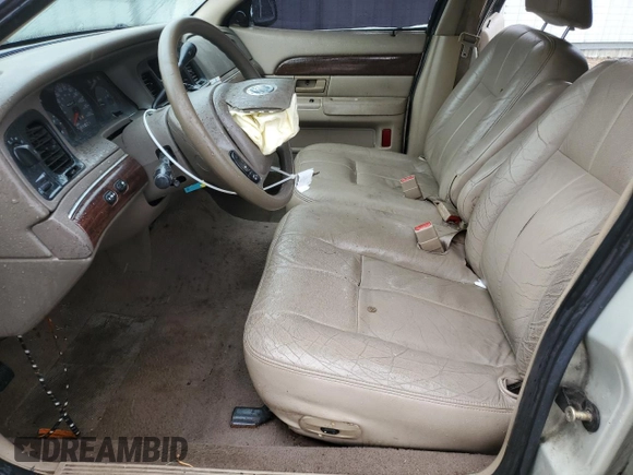 2003 Mercury Grand Marquis GS Convenience z VIN 2MEFM74W53X702387, wystawiony jako Copart lot #52852475 z przebiegiem 246 543 mil mil oraz Szkoda całkowita • Salvage title. Historia ofert i sprzedaży dostępna na DreamBid. Obrazek 7.