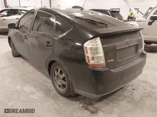 2007 Toyota Prius with VIN JTDKB20U373234398, listed as a IAAI auction lot 41986987 with 236,989 mi miles. Bid and sale history available at carsss.com. Image 3.