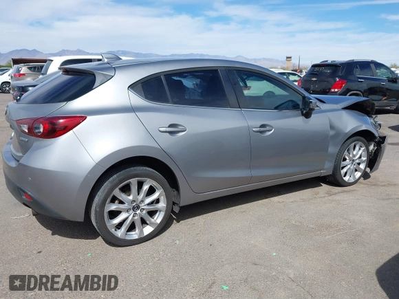 2015 Mazda 3 S Grand Touring with VIN JM1BM1M38F1256560, listed as a IAAI auction lot 41655332 with 121,179 mi miles and . Bid and sale history available at DreamBid. Image 14.