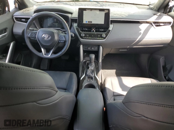 2024 Toyota Corolla Cross Hybrid S with VIN 7MUFBABG7RV043044, listed as a Copart auction lot 61828715 with 10,473 mi miles and Salvage title. Bid and sale history available at DreamBid. Image 8.