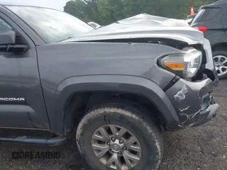 2016 Toyota Tacoma SR with VIN 5TFRX5GN6GX070766, listed as a IAAI auction lot 40461070 with 144,039 mi miles and . Bid and sale history available at DreamBid. Image 18.