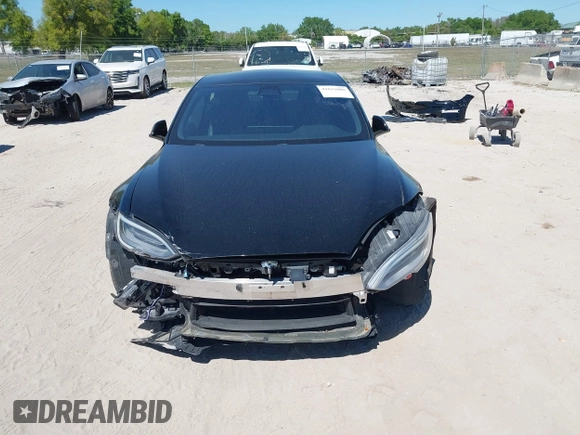 2021 Tesla Model S Plaid with VIN 5YJSA1E66MF452258, listed as a IAAI auction lot 41832000 with 42,845 mi miles and . Bid and sale history available at DreamBid. Image 13.