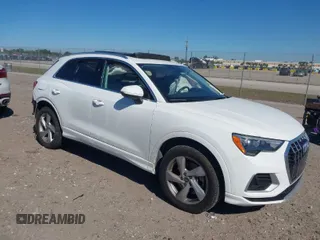 2021 Audi Q3 Premium with VIN WA1AUCF32M1097059, listed as a IAAI auction lot 41825132 with 66,144 mi miles and . Bid and sale history available at DreamBid. Image 1.