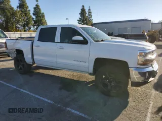 2018 Chevrolet Silverado 1500 LT with VIN 3GCPCREC3JG200722, listed as a Copart auction lot 48405655 with 97,384 mi miles and Salvage Title. Bid and sale history available at DreamBid. Image 4.