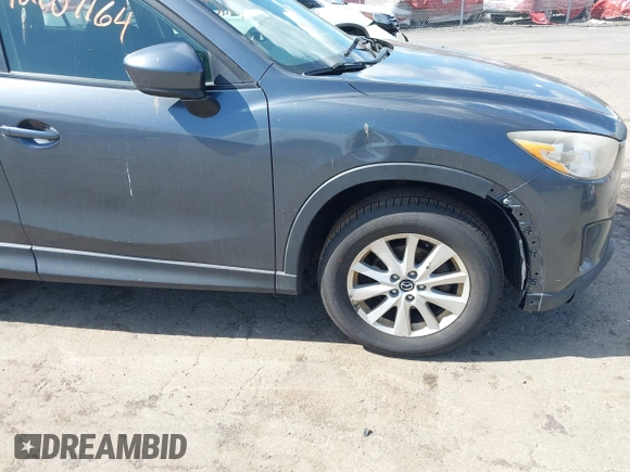 2013 Mazda CX-5 Sport with VIN JM3KE4BE7D0164398, listed as a IAAI auction lot 42107164 with 166,852 mi miles. Bid and sale history available at carsss.com. Image 20.