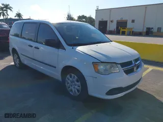 2015 Dodge Grand Caravan American Value Pkg with VIN 2C4RDGBGXFR549962, listed as a IAAI auction lot 41515525 with 199,962 mi miles. Bid and sale history available at carsss.com. Image 1.