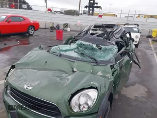 2015 MINI Countryman z VIN WMWZB3C59FWR43209, wystawiony jako IAAI lot #41761218 z przebiegiem Nie podano mil oraz . Historia ofert i sprzedaży dostępna na DreamBid. Obrazek 6.
