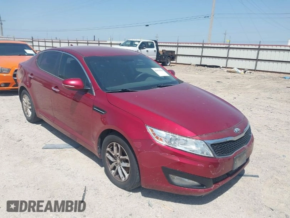 2013 Kia Optima LX with VIN 5XXGM4A7XDG247696, listed as a IAAI auction lot 42013026 with 119,209 mi miles. Bid and sale history available at carsss.com. Image 1.