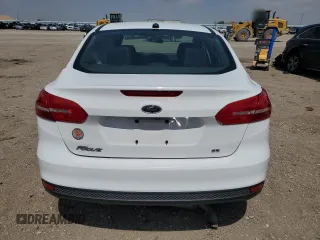 2018 Ford Focus SE z VIN 1FADP3F25JL272797, wystawiony jako Copart lot #54626215 z przebiegiem 116 679 mil mil oraz Szkoda całkowita • Salvage title. Historia ofert i sprzedaży dostępna na DreamBid. Obrazek 6.