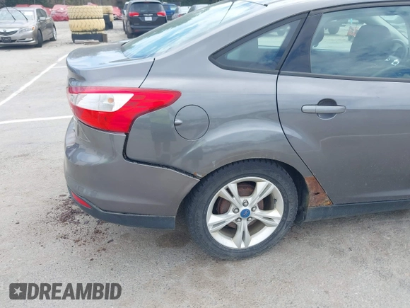 2013 Ford Focus SE with VIN 1FADP3F27DL224433, listed as a IAAI auction lot 42652229 with 127,887 mi miles and . Bid and sale history available at DreamBid. Image 6.