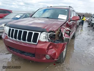 2009 Jeep Grand Cherokee Limited with VIN 1J8HR58P09C520498, listed as a IAAI auction lot 41419124 with 101,435 mi miles. Bid and sale history available at carsss.com. Image 2.