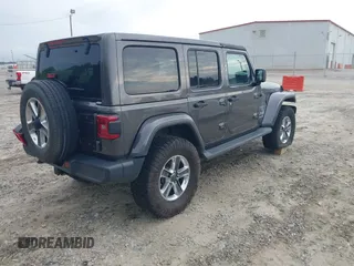 2018 Jeep Wrangler Unlimited Sahara with VIN 1C4HJXEN8JW303023, listed as a IAAI auction lot 42138631 with 72,463 mi miles and . Bid and sale history available at DreamBid. Image 4.