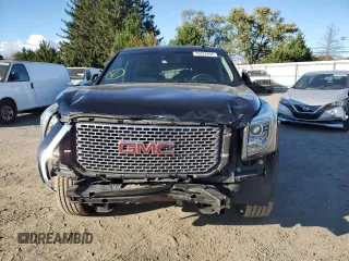 2016 GMC Yukon Denali with VIN 1GKS1CKJXGR329103, listed as a Copart auction lot 75492494 with 124,374 mi miles and Salvage Title. Bid and sale history available at carsss.com. Image 5.
