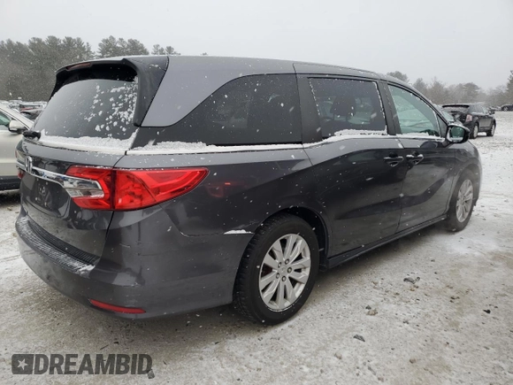 2018 Honda Odyssey LX with VIN 5FNRL6H28JB013928, listed as a Copart auction lot 87695025 with 194,390 mi miles and Salvage Title. Bid and sale history available at carsss.com. Image 3.