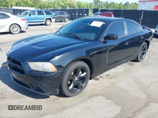 2012 Dodge Charger SXT with VIN 2C3CDXHG2CH258844, listed as a IAAI auction lot 42025908 with 214,529 mi miles. Bid and sale history available at carsss.com. Image 2.