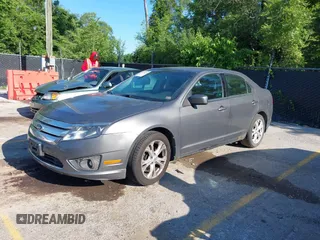 2012 Ford Fusion SE with VIN 3FAHP0HA9CR171027, listed as a IAAI auction lot 42394989 with 249,745 mi miles and . Bid and sale history available at DreamBid. Image 2.