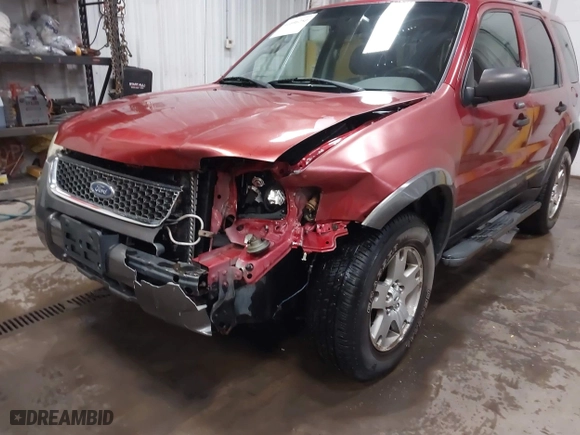 2003 Ford Escape XLT Popular 2 with VIN 1FMCU93173KA52806, listed as a IAAI auction lot 41696250 with 138,338 mi miles. Bid and sale history available at carsss.com. Image 6.