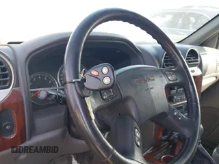 2003 GMC Envoy SLT with VIN 1GKES16S336101568, listed as a IAAI auction lot 40187998 with 185,402 mi miles. Bid and sale history available at carsss.com. Image 11.