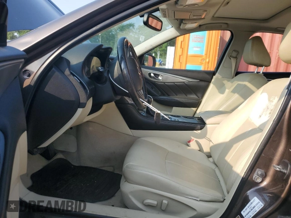2014 Infiniti Q50 Premium with VIN JN1BV7ARXEM680167, listed as a Copart auction lot 59702095 with 108,196 mi miles and Salvage title. Bid and sale history available at DreamBid. Image 7.