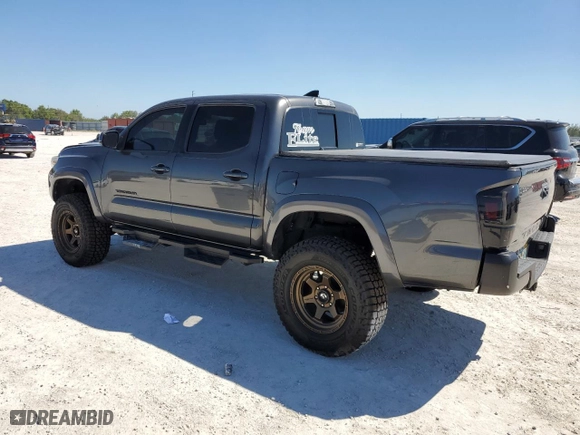 2018 Toyota Tacoma SR5 with VIN 3TMAZ5CNXJM057187, listed as a Copart auction lot 48705665 with 120,057 mi miles and Salvage Title. Bid and sale history available at carsss.com. Image 2.