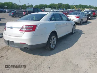 2015 Ford Taurus SEL with VIN 1FAHP2E97FG149657, listed as a IAAI auction lot 42400856 with 138,386 mi miles and . Bid and sale history available at DreamBid. Image 4.