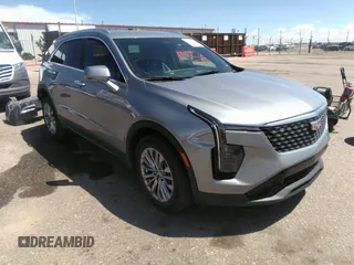 2024 Cadillac XT4 FWD Premium Luxury with VIN 1GYFZCR46RF221436, listed as a IAAI auction lot 42140984 with 32,534 mi miles and . Bid and sale history available at carsss.com. Image 1.