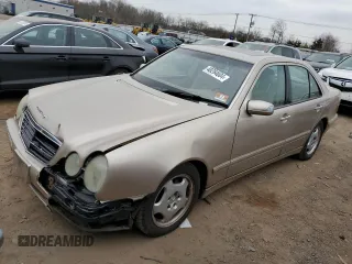 2002 Mercedes-Benz E-Class with VIN WDBJF82J52X062915, listed as a Copart auction lot 48284604 with 150,227 mi miles and Salvage Title. Bid and sale history available at carsss.com. Image 1.